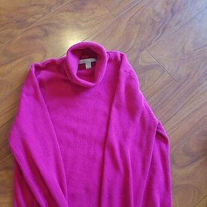 Bright pink turtleneck sweater